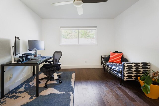 9421 Spring Hollow Dr, Austin, TX 78750 - home office with a ceiling fan, hardwood / wood-style floors, and baseboards