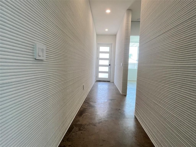204 Blue Blaze Trl, Georgetown, TX 78628 - hallway featuring finished concrete floors and recessed lighting