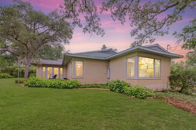2507 Inwood Pl, Austin, TX 78703 - view of front of home with brick siding and a yard