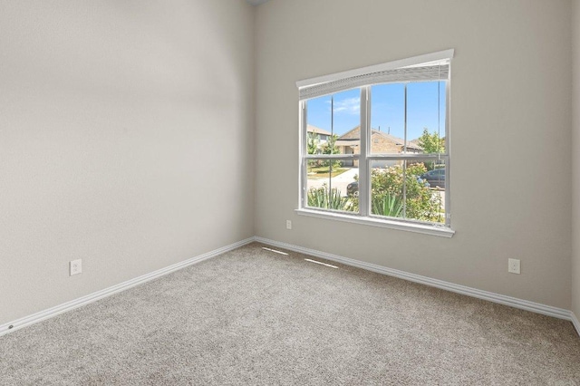 433 Vista Portola Loop, Liberty Hill, TX 78642 - carpeted empty room featuring baseboards
