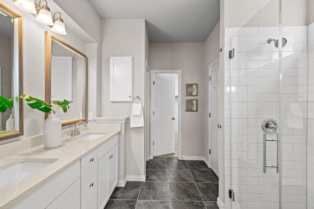 433 Vista Portola Loop, Liberty Hill, TX 78642 - full bathroom with a stall shower, baseboards, and double vanity