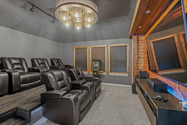 433 Vista Portola Loop, Liberty Hill, TX 78642 - home theater room featuring carpet flooring, a chandelier, baseboards, and lofted ceiling