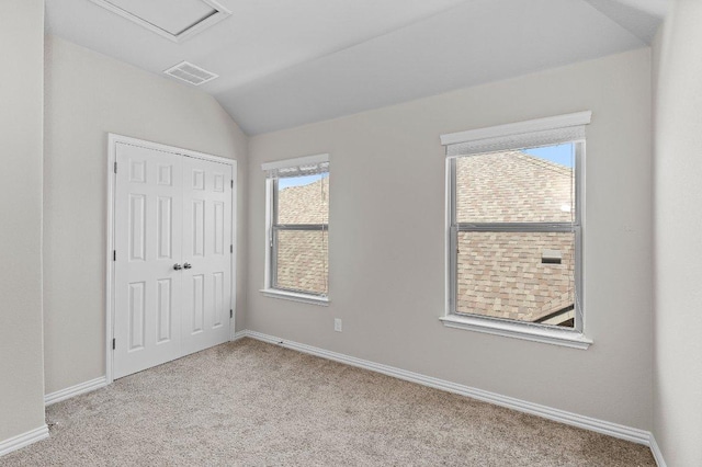 433 Vista Portola Loop, Liberty Hill, TX 78642 - unfurnished bedroom with carpet flooring, vaulted ceiling, baseboards, and a closet