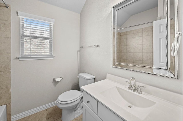 433 Vista Portola Loop, Liberty Hill, TX 78642 - bathroom featuring toilet, vanity, tile patterned flooring, and baseboards