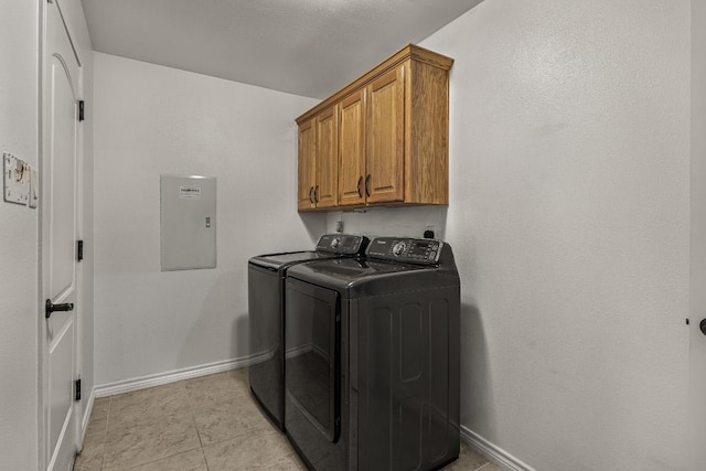 1420 Gomer Ln, Harker Heights, TX 76548 - laundry area featuring washing machine and clothes dryer, cabinet space, and electric panel