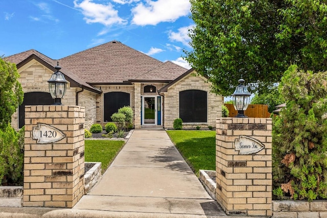 1420 Gomer Ln, Harker Heights, TX 76548 - french country style house featuring stone siding and roof with shingles