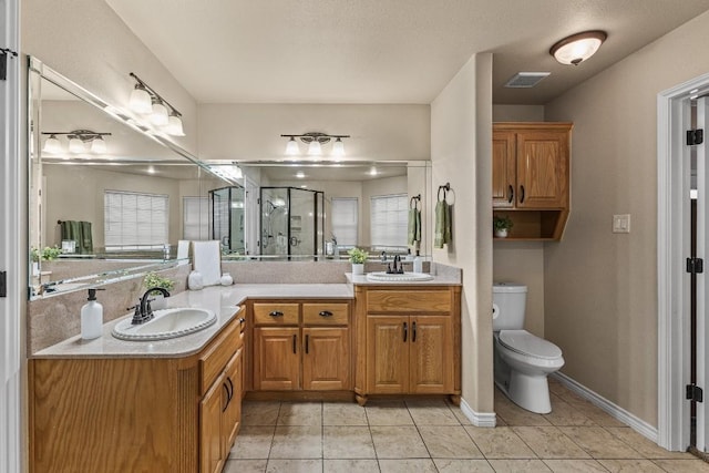 1420 Gomer Ln, Harker Heights, TX 76548 - full bath with double vanity, a shower stall, and tile patterned flooring