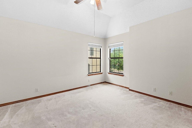 9002 Scotsman Dr, Austin, TX 78750 - carpeted spare room with baseboards, a ceiling fan, and high vaulted ceiling