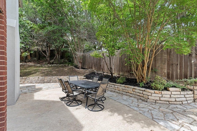 9002 Scotsman Dr, Austin, TX 78750 - fenced backyard featuring outdoor dining area and a patio