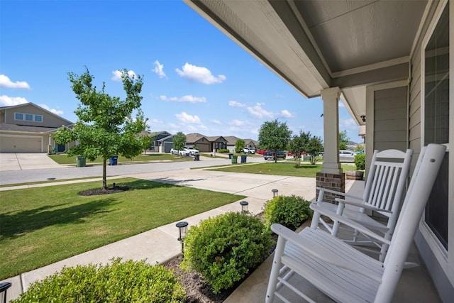 109 Dickinson Bayou Cv, Hutto, TX 78634 - view of patio with covered porch and a residential view