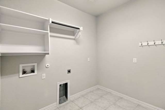 laundry area featuring gas dryer hookup, electric dryer hookup, washer hookup, and baseboards