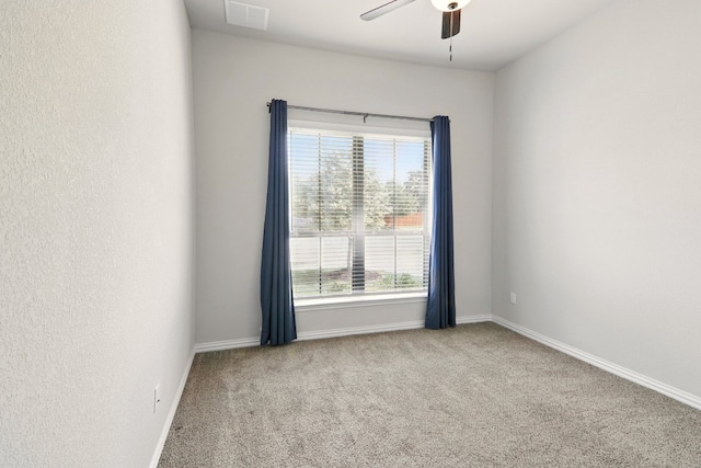 2300 La Mirada St, Leander, TX 78641 - carpeted spare room with a ceiling fan and baseboards