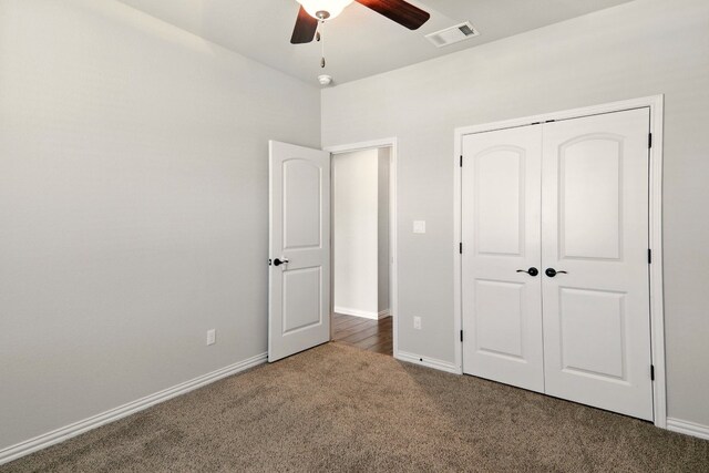 2300 La Mirada St, Leander, TX 78641 - unfurnished bedroom with carpet floors, baseboards, a closet, and ceiling fan