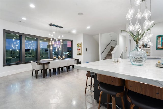 108 Stephanie Ln, Austin, TX 78738 - dining area with stairs, recessed lighting, finished concrete floors, and baseboards