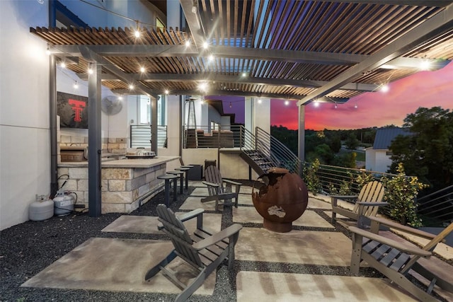 view of patio / terrace featuring exterior kitchen