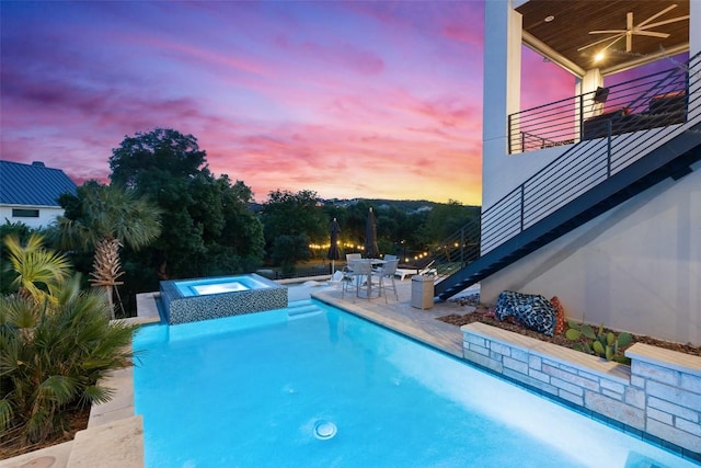 108 Stephanie Ln, Austin, TX 78738 - view of pool featuring stairway, a pool with connected hot tub, outdoor dining area, a patio area, and a ceiling fan