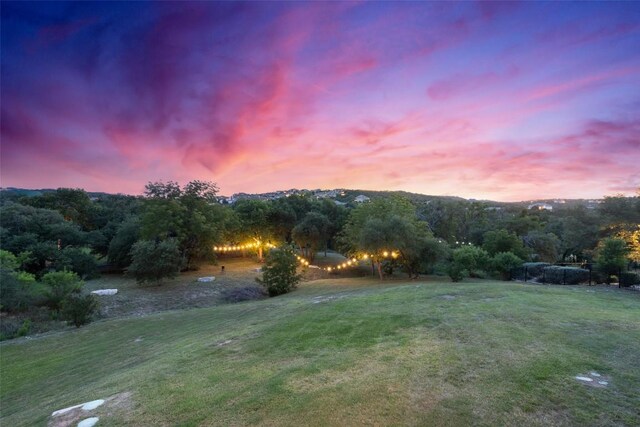 108 Stephanie Ln, Austin, TX 78738 - yard at dusk featuring a yard