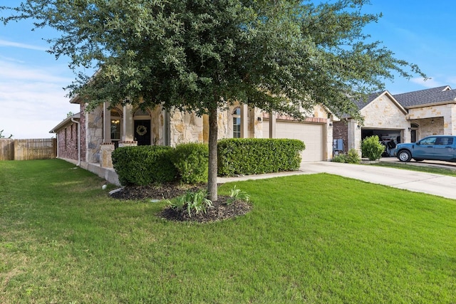 view of property hidden behind natural elements with stone siding, driveway, and an attached garage