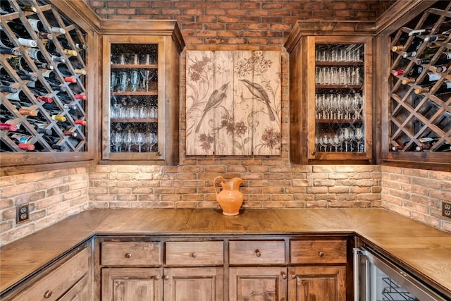 1710 Mount Larson Rd, Austin, TX 78746 - wine cellar featuring beverage cooler and brick wall