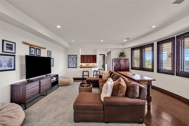 1710 Mount Larson Rd, Austin, TX 78746 - living room featuring baseboards, recessed lighting, and wood finished floors