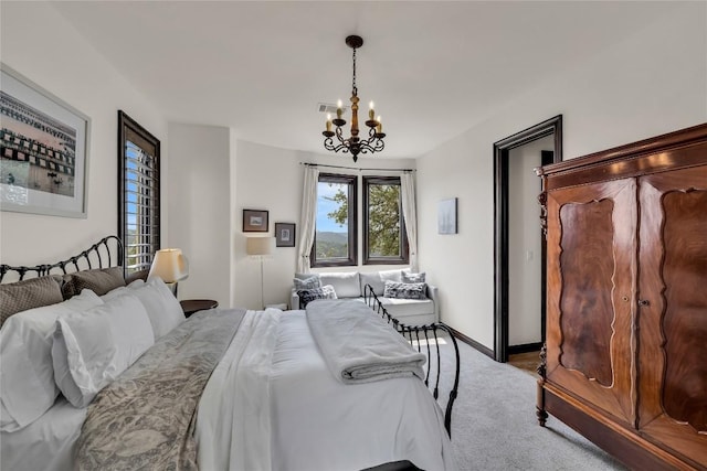1710 Mount Larson Rd, Austin, TX 78746 - carpeted bedroom with a chandelier and baseboards