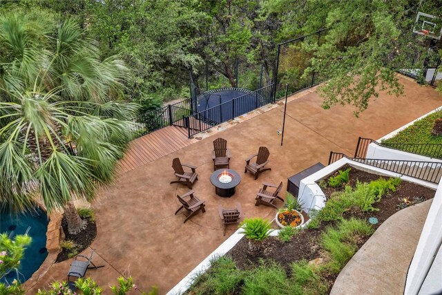 1710 Mount Larson Rd, Austin, TX 78746 - view of patio featuring an outdoor fire pit