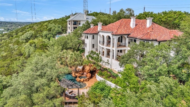 1710 Mount Larson Rd, Austin, TX 78746 - view of subject property with a heavily wooded area