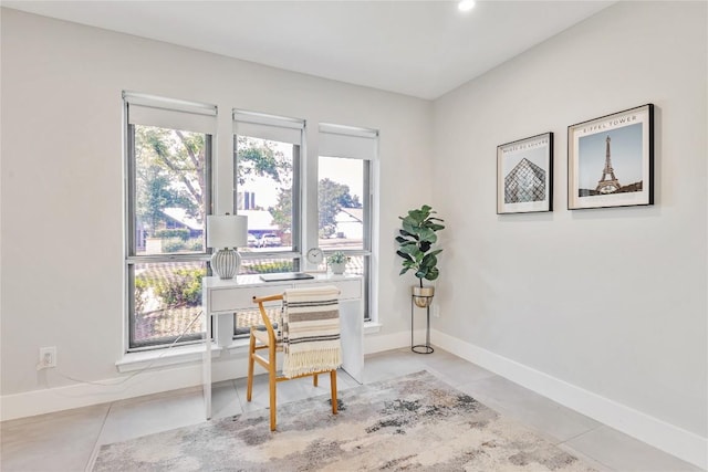 office area featuring plenty of natural light, baseboards, light tile patterned floors, and recessed lighting
