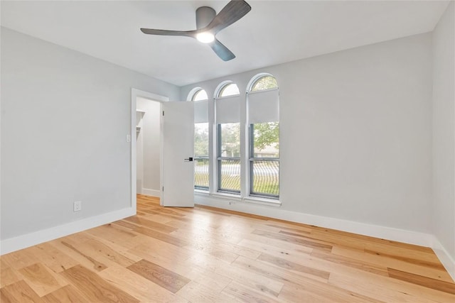 7000 Scenic Brook Dr, Austin, TX 78736 - empty room featuring baseboards, wood finished floors, and ceiling fan