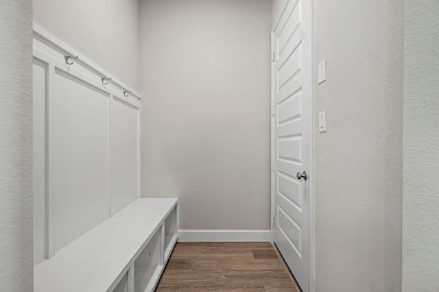 14505 Kira Ln, Manor, TX 78653 - mudroom featuring dark wood-style flooring and baseboards