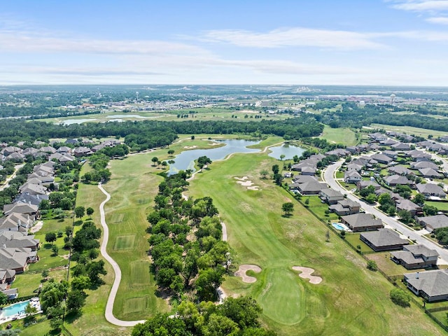 14505 Kira Ln, Manor, TX 78653 - aerial overview of property's location featuring nearby suburban area, a nearby body of water, a local golf course, and a tree filled landscape