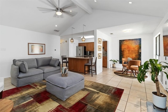 8807 Honeysuckle Trl, Austin, TX 78759 - living room with light tile patterned floors, a ceiling fan, beamed ceiling, high vaulted ceiling, and recessed lighting