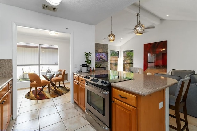 8807 Honeysuckle Trl, Austin, TX 78759 - kitchen featuring stainless steel electric stove, open floor plan, light tile patterned floors, ceiling fan, and brown cabinets
