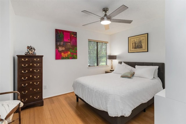 8807 Honeysuckle Trl, Austin, TX 78759 - bedroom featuring wood finished floors and ceiling fan