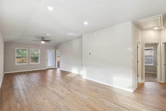 832 Sun Grove Trl, Georgetown, TX 78628 - empty room featuring attic access, baseboards, light wood-style floors, and recessed lighting