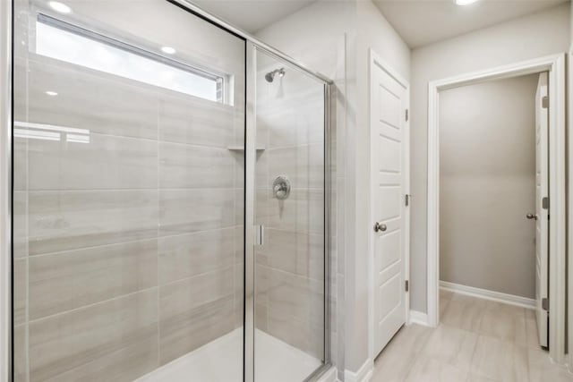 832 Sun Grove Trl, Georgetown, TX 78628 - bathroom with a shower stall and baseboards