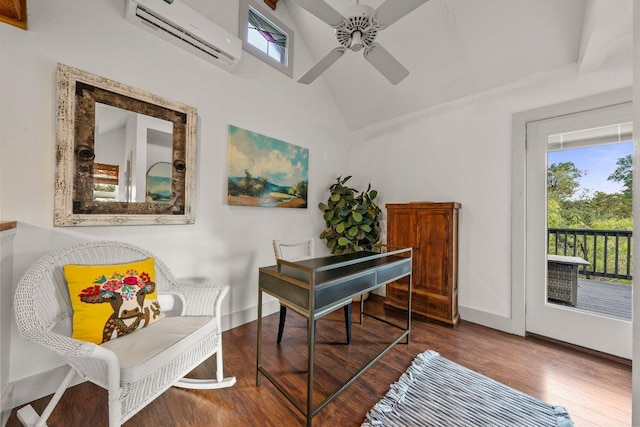 sitting room featuring a wall mounted AC, a ceiling fan, wood finished floors, vaulted ceiling, and baseboards