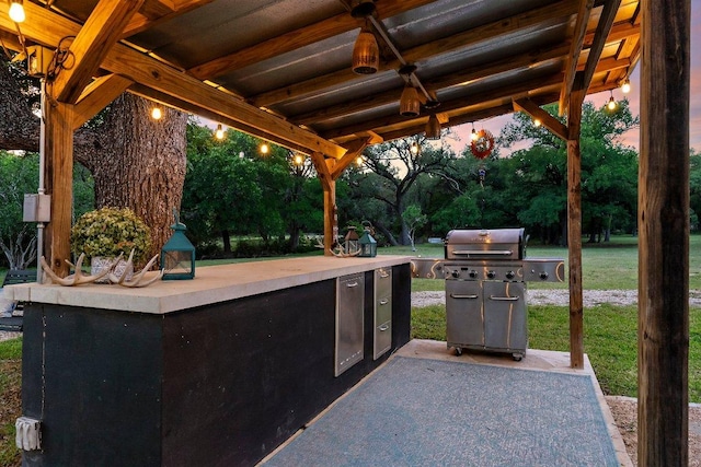 view of patio / terrace featuring exterior kitchen and area for grilling