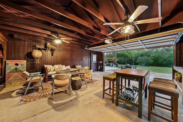 view of patio featuring a ceiling fan, outdoor lounge area, and outdoor dining area