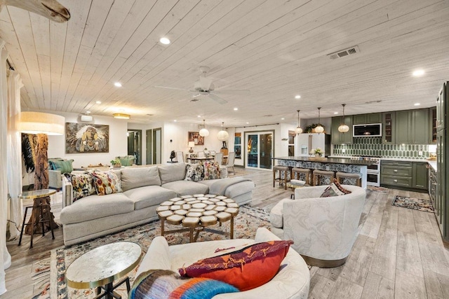 living area with wood ceiling, light wood-style floors, recessed lighting, and ceiling fan