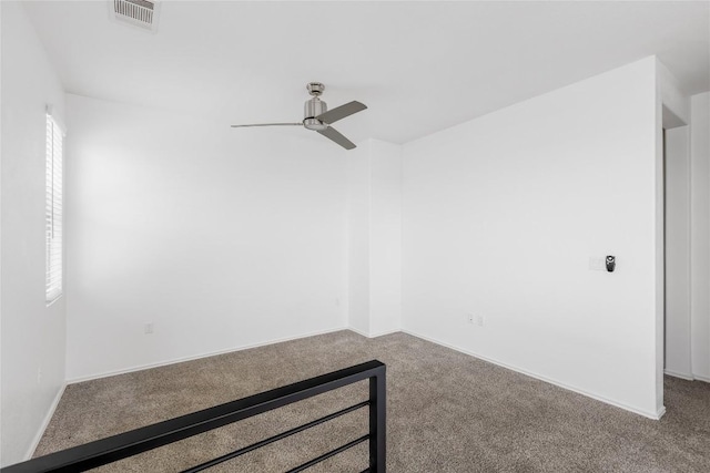 1203 Diggy Dr, Austin, TX 78748 - unfurnished room with a ceiling fan, carpet floors, and baseboards