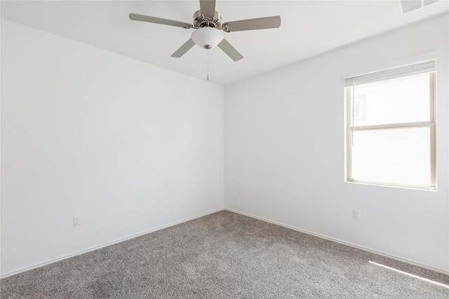 1203 Diggy Dr, Austin, TX 78748 - spare room with carpet floors, a ceiling fan, and baseboards