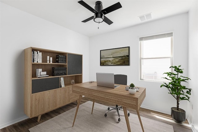 1203 Diggy Dr, Austin, TX 78748 - office space with wood finished floors, ceiling fan, and baseboards