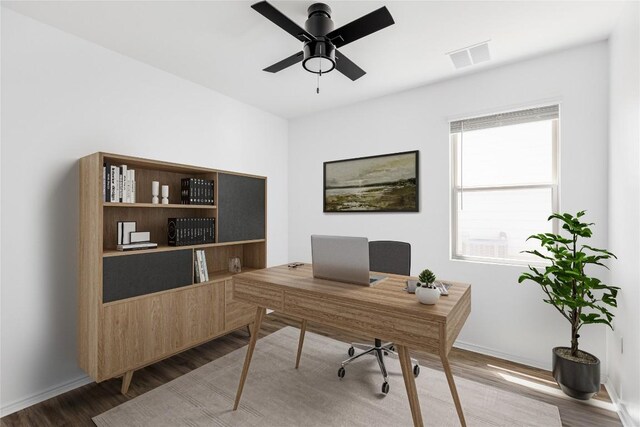 1203 Diggy Dr, Austin, TX 78748 - office area featuring wood finished floors and a ceiling fan