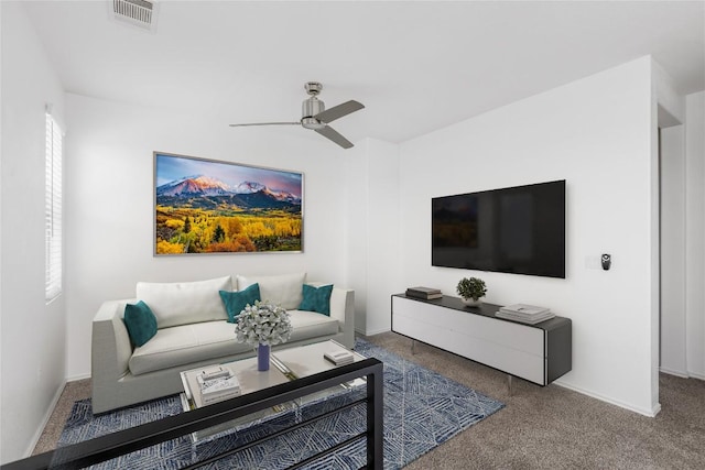 1203 Diggy Dr, Austin, TX 78748 - carpeted living room featuring a ceiling fan and baseboards