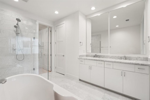 2805 Mccurdy St Unit 2, Austin, TX 78723 - full bath featuring a stall shower, recessed lighting, double vanity, and a freestanding bath