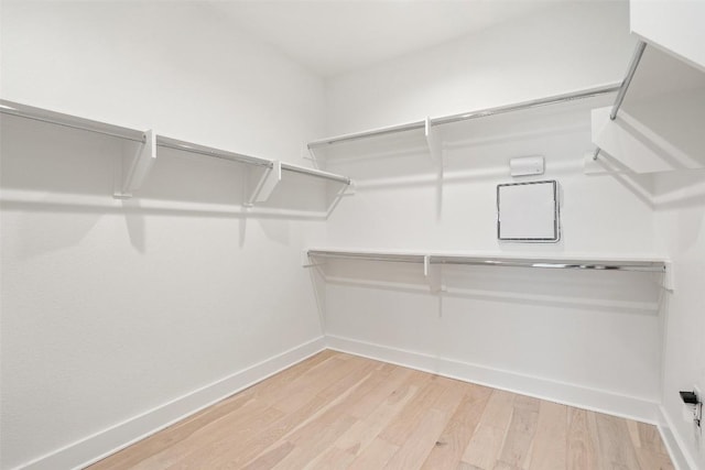 2805 Mccurdy St Unit 2, Austin, TX 78723 - walk in closet featuring light wood finished floors
