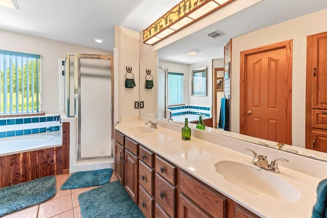 9038 Eagles Vw, Spring Branch, TX 78070 - bathroom featuring a shower stall, a bath, double vanity, tile patterned floors, and recessed lighting