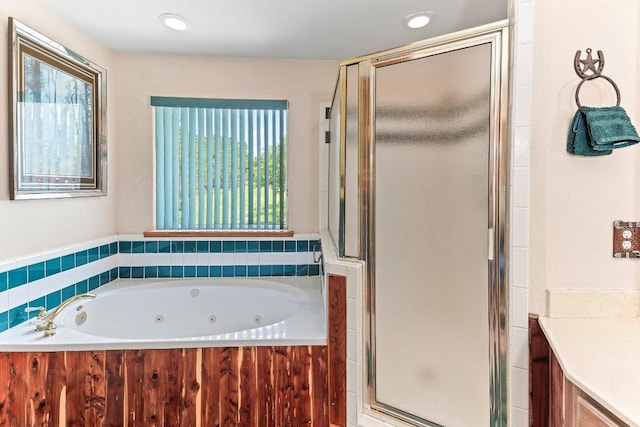 9038 Eagles Vw, Spring Branch, TX 78070 - full bathroom featuring a shower stall, a whirlpool tub, vanity, and recessed lighting