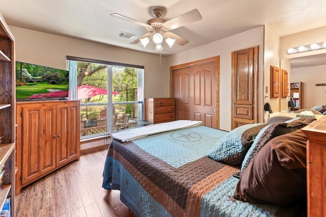9038 Eagles Vw, Spring Branch, TX 78070 - bedroom featuring light wood finished floors and a ceiling fan